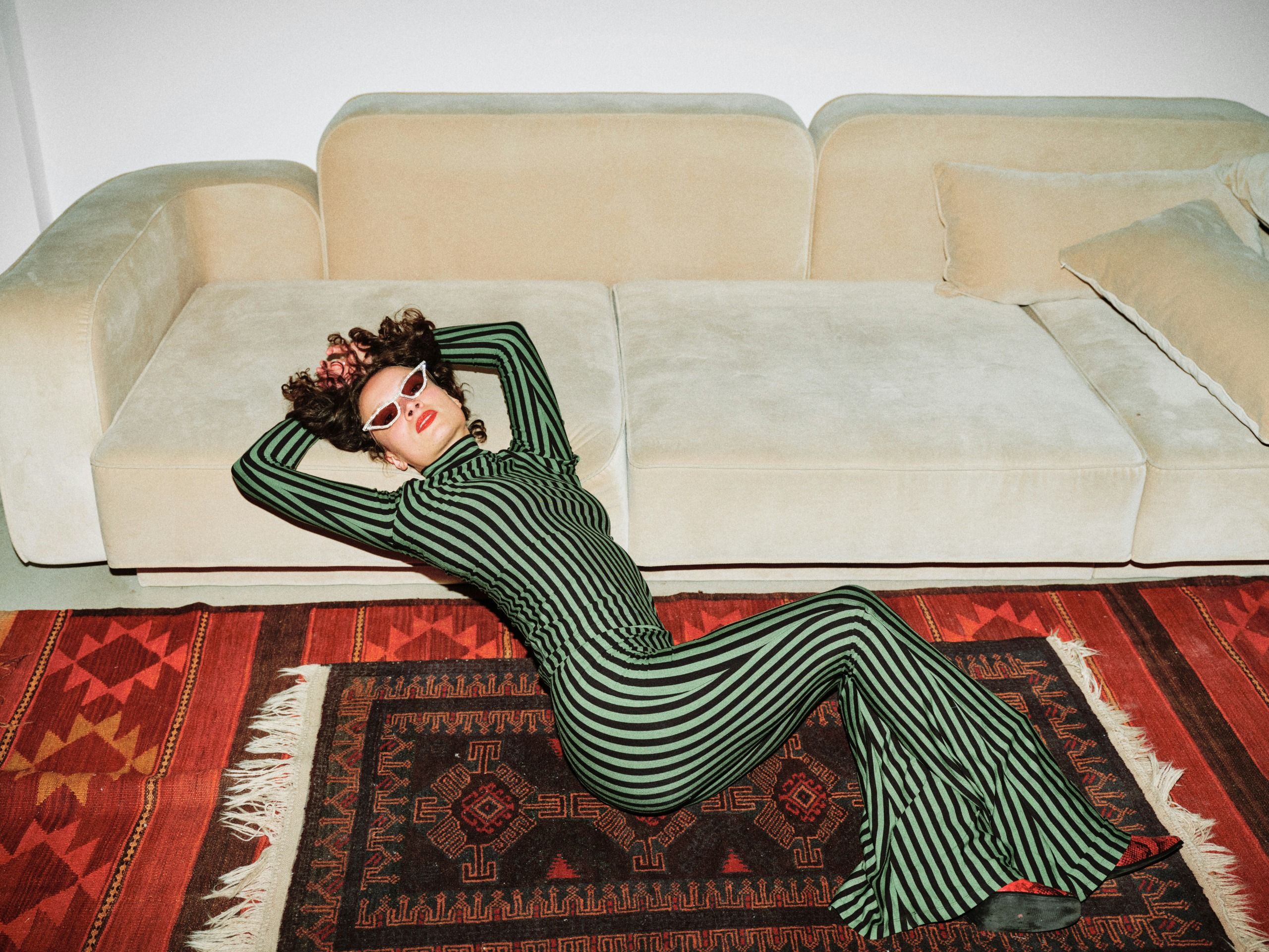 Model wearing a striped fashion editorial look